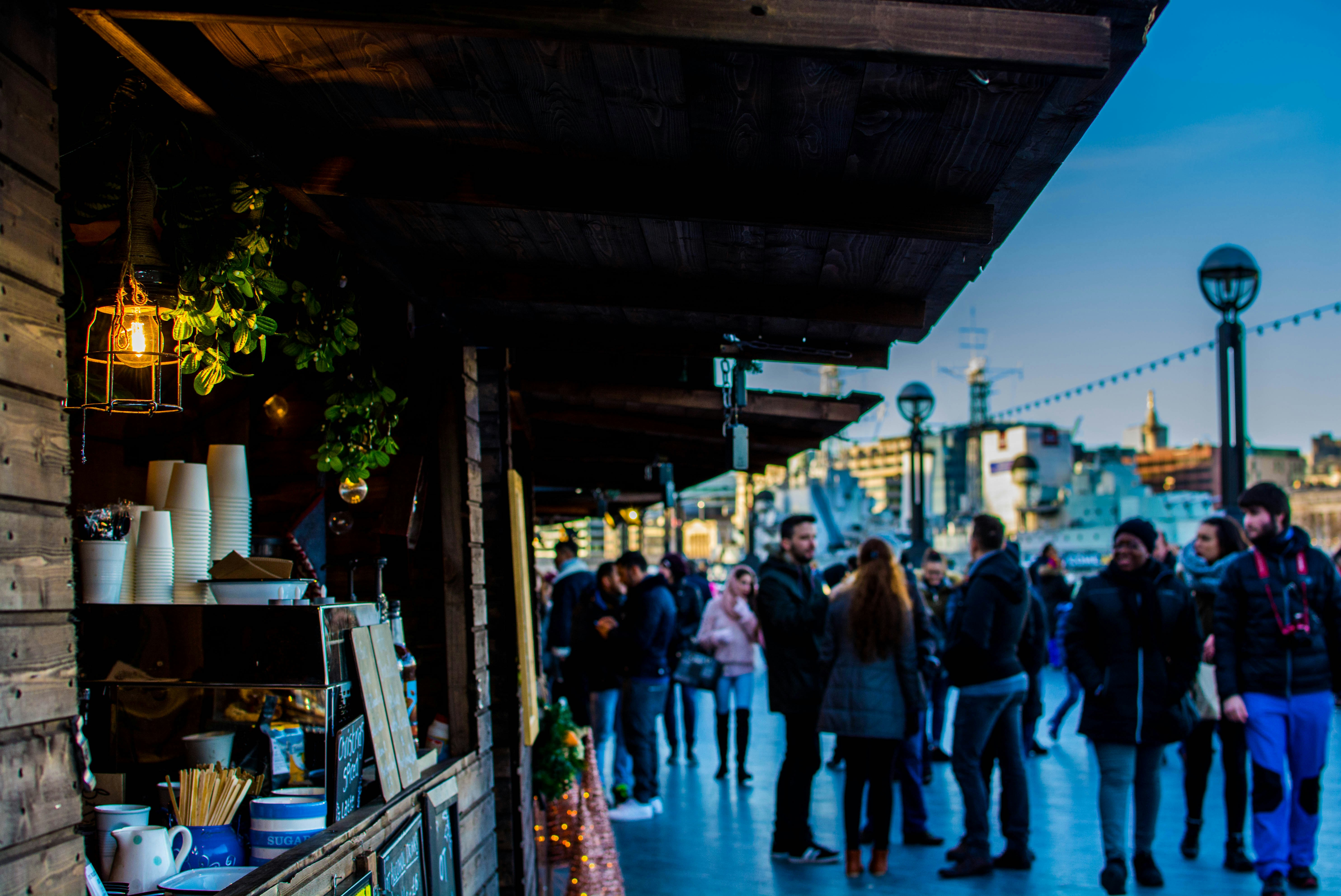 photo of people walking near store